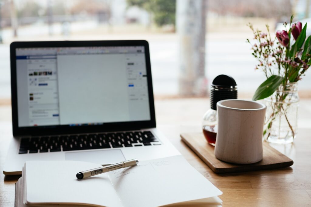 Laptop and notepad
